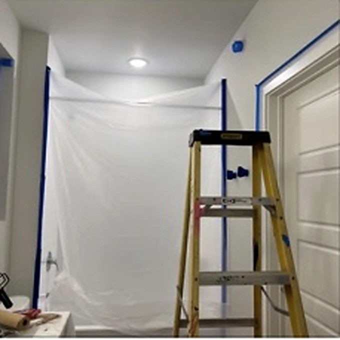 Paint preparation with drop cloth protection and ladder