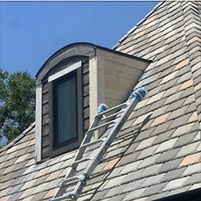 Close-up of dormer and roof detail from an exterior project